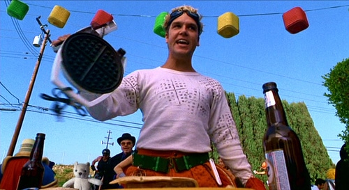 A young Dane Cook as "The Waffler with his Griddle of Justice"
