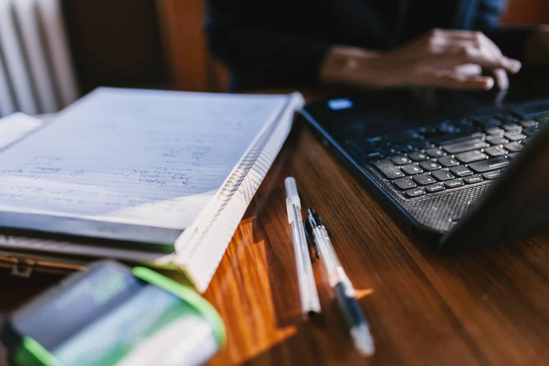 Working with computer and paperwork